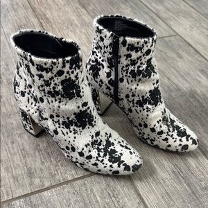 XOXO Black and White Heeled Boots with Speckled Design